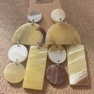 Statement earrings
Acrylic